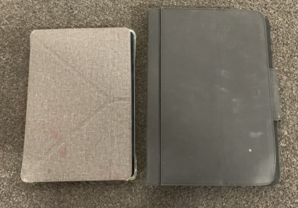 (2) IPADS WITH HEAVY DUTY CASES (BOTH POWER ON)