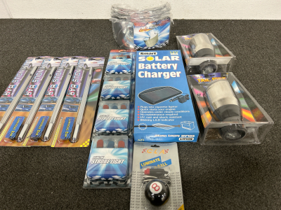 ALL UNOPENED AUTO ACCESSORIES: 2 TAIL PIPES, 4 PLUG-IN STROBE LIGHTS, 4 LUMINOUS BARS, 12 HEAT SHIELDS, 1 LUMINATE 8-BALL AND 1 SOLAR BATTERY CHARGER