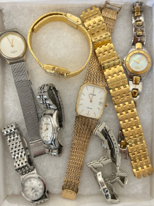 (7) BEAUTIFUL WATCHES AND (1) GOLD TONED WATCH BAND- SOME MAY REQUIRE NEW BATTERY OR REPAIR