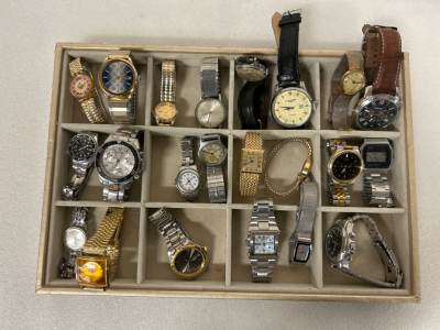 (22) WATCHES IN DISPLAY FLAT- SOME MAY REQUIRE NEW BATTERY OR SOME REPAIR