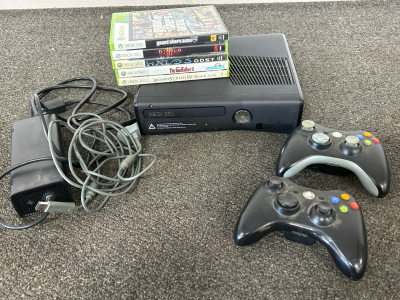 WORKING XBOX 360 WITH 2 WIRELESS CONTROLLERS, 5 GAMES: GRAND THEFT AUTO 5, DIABLO, HALO 3 ODST, THE GODFATHER 2, ASSASINS CREED 4 “BLACK FLAG”, POWER BOX, CONTROLLER CHARGING CORD AND VIDEO CABLES