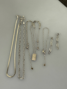 SILVER TONE NECKLACES (3), BRACELET, ANKLET AND A PAIR OF EARRINGS