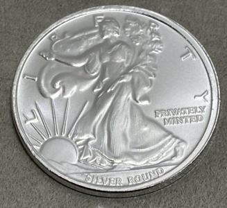 (1) 1 Troy Ounce Money Metals Exchange American Eagle .999 Silver Round