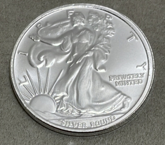 (1) 1 Troy Ounce Money Metals Exchange American Eagle .999 Silver Round
