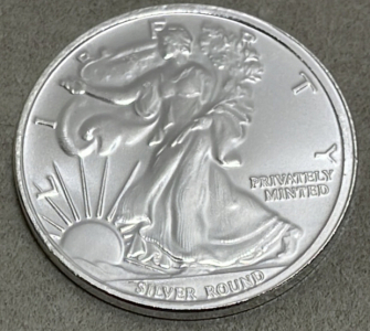 (1) 1 Troy Ounce Money Metals Exchange American Eagle .999 Silver Round