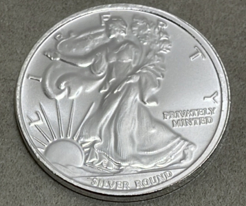 (1) 1 Troy Ounce Money Metals Exchange American Eagle .999 Silver Round