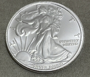 (1) 1 Troy Ounce Money Metals Exchange American Eagle .999 Silver Round