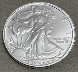 (1) 1 Troy Ounce Money Metals Exchange American Eagle .999 Silver Round