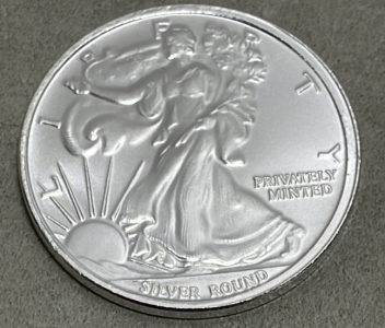 (1) 1 Troy Ounce Money Metals Exchange American Eagle .999 Silver Round