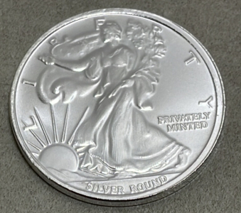 (1) 1 Troy Ounce Money Metals Exchange American Eagle .999 Silver Round
