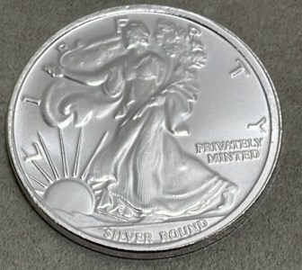 (1) 1 Troy Ounce Money Metals Exchange American Eagle .999 Silver Round