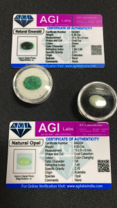 (2) Certificed Natural Gemstones: (1) 8.20ct Green Emerald, (1) 6.00ct Opal Cabochon