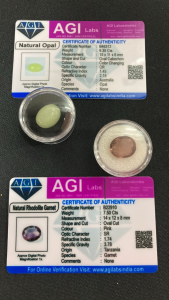 (2) Certified Natural Gemstones: (1) 9.35ct Color Changing Opal Cabochon, (1) 7.50ct Oval Cut Pink Rhodolite Garnet