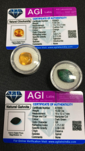 (2) Certified Natural Gemstones: (1) 10.50ct Marquise Cut Dark Green Gahnite, (1$ 9.35ct Cushion Cut Orange Clinohumite