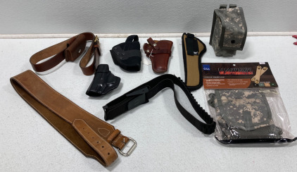 (1) BlackHawk Speed Clips (4) Assorted Pistol Holsters And More!