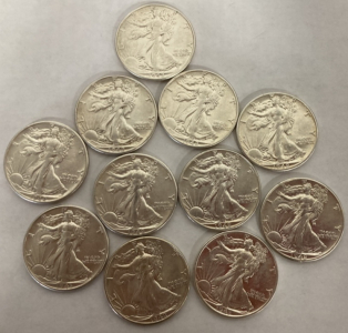 (11) 1942/1943 Walking Liberty Half Dollars