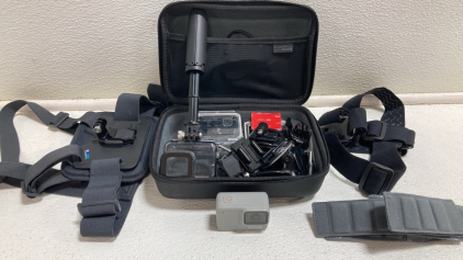 GoPro Camera w/ Assorted Cases, Clip Accessories and Wearable Attachments