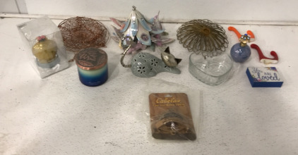 (1) Autumn Sky Scented Candle, (1) Hanging Bird Wind Chime Set, (1) Mini You Are Loved Decoration Block, (1) Cabelas Cast Iron Bottle Opener And More