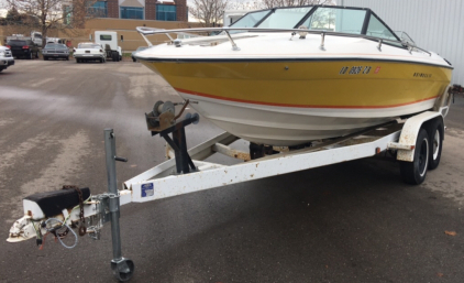 18' REINELL BOAT WITH 24' DOUBLE AXEL TRAILER!