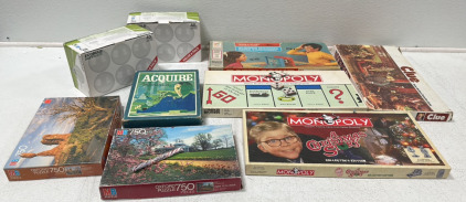 (5) Board Games Including 2 Different Styles Of Monopoly, Clue, BattleShip And Aquire, (2) 750 Piece Puzzles And (2) Boxes Of Softwhite Ecobulb 40 w Lightbulbs