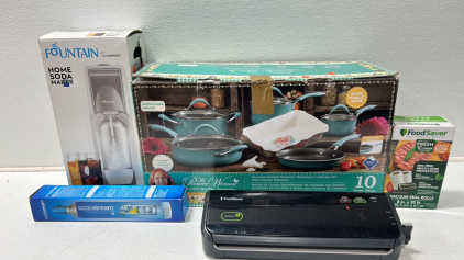 (1) 10-Piece Cookwear Set (1) Sodastream With Co2 (1) Vacuum Sealer With Bags