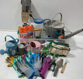 Outdoor Multi Outlet Power Supply Stake; Pollinator Wildflower Mix; Gardening Gloves; Small Spray Bottle; Gardening Pouch; Watering Cans; Hose Quick Connector Stakes; Various Gardening Tools