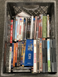 BOX OF MOVIES INCLUDIG DOWNSIZING, CAPTAIN BLOOD, THE DARK KNIGHT, SAVING PRIVATE RYAN, SOMETHINGS GOTTA GIVE, BUMBLEBEE, ER, ESCAPE FROM PLANET EARTH AND MORE