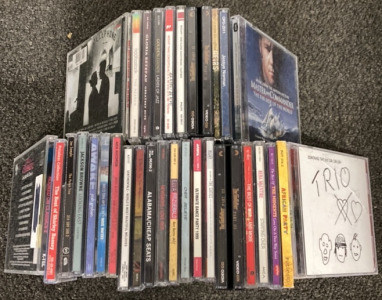 MUSIC CDS INCLUDING SHIRLEY BASSEY, REBA MCENTIRE, JOE SAMPLE, JACKSON BROWNE, JOSH GROBAN, CELINE DION, JIMMY BUFFET AND MORE