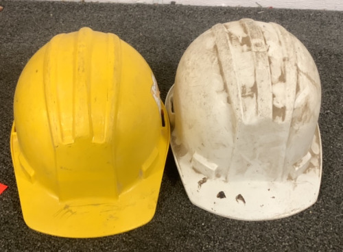 (1) YELLOW CONSTRUCTION HARD HAT AND (1) WHITE CONSTRUCTION HARD HAT