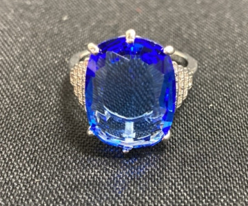 Oval Cut Faceted Blue Topaz .925 Ring (Size 10)