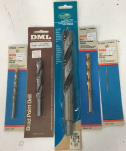 (3) Bosch Drill Bits (1) DML Drill Bit (1) Timberline Drill Bit