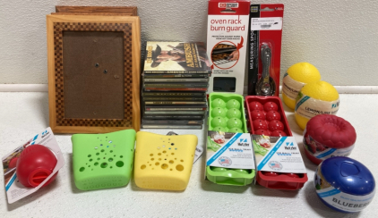 (4) Picture Frames, (13) Assorted CDs, (2) Oven Rack Burn Guard, (2) Ice Ball Trays, (2) Lemon/Lime Savers, and more