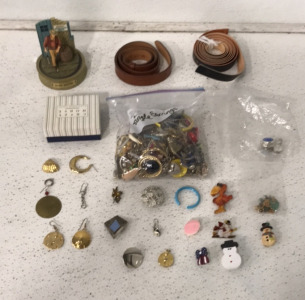 (1) Bag Full Of Single Earings, (1) John Wayne 4 3/4&rsquo;&rsquo; Decoration, (1) Small Genuine Leather Belt, (1) 03&rsquo; 34-36 Genuine Leather Playboy Belt And More