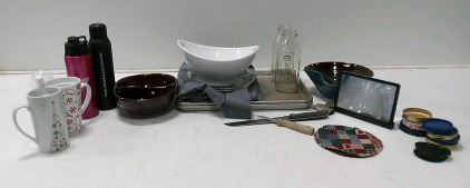 (2) Christmas Coffee Mugs, (2) Metal Bottles, (2) Food Network Glass Dishes, Mar-Crest Oven Proof Stoneware, (2) Pie Dish, (2) Clover Leaf Creamery Bottles, Grey Tablecloth, (2) Stainless Steel Oven Pans, Pairing Knife, Bread Knife, Kitchen Clip, (4) Kitc