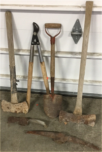 (2) Pick Axe Heads (2) Double Sided Axe (1) Garden Shears (1) Shovel
