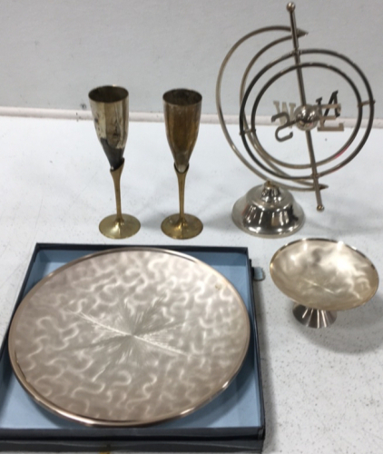 (1) Compass Decor (1) Silver Plate (1) Silver Platter (2) Brass Goblets