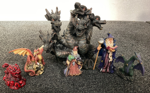 COLLECTIBLE DRAGON AND WIZARD FIGURINES— SOME DAMAGE