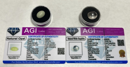 (1) 13.95ct White Sapphire, (1) 5.05ct Color Changing Opal Cabochon&hellip; Both Natural Gemstones W/ C.O.A.