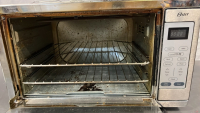 OSTER TOSTER OVEN ( POWERS ON ) 12”x 22”x 16 1/2” - 2