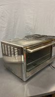 OSTER TOSTER OVEN ( POWERS ON ) 12”x 22”x 16 1/2” - 3