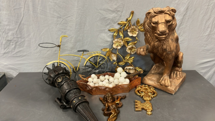 LION STATUE, METAL YELLOW BIKE, HANGING GOLD FLOWER PIECE AND MORE