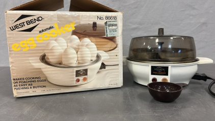 WEST BEND AUTOMATIC EGG COOKER ( POWERS ON )