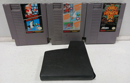 (3) Nintendo Entertainment System Games Including (2) Super Mario Bros./Duck Hunt (1) Double Dragon 3 (1) Sleeve