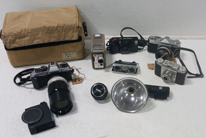 (2) Vintage Konica Cameras (1) Vintage Minolta camera (1) Bucks Bags Camera Bag & More