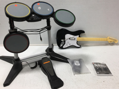 (1) Rock BandGuitar (1) Rock Band Drum Set (1) Guitar Hero Microphone (1) Wii Game The Beatles