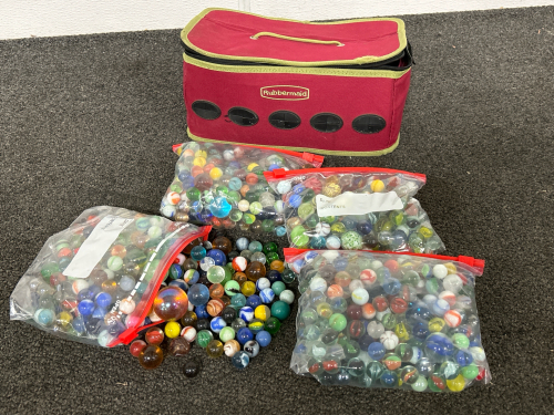 4 BAGS OF MARBLES WITH CASE