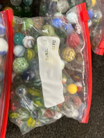 4 BAGS OF MARBLES WITH CASE - 4