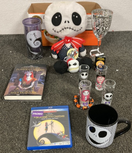 NIGHTMARE BEFORE CHRISTMAS MEMORABLIA INCLUDING NBC BLU-RAY DVD, LONG LIVE THE PUMPKIN QUEEN BOOK, FOUR SHOT GLASSES, ONE MUG, ONE TUMBLER AND MORE