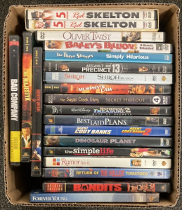 20 DVDS INCLUDING OLIVER TWIST, THE THREE STOOGES, THE SIMPLE LIFE, DINOSAUR PLANET, RUMOR HAS IT, FOREVER YOUNG, BAD COMPANY AND MORE