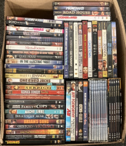 DVDS INCLUDING IN ELECTRIC MIST, MEET THE FOCKERS, REDNECK COMEDY, BRIANS SONG, THE GOONIES, HOTEL RWANDA, WALL STREET AND MORE